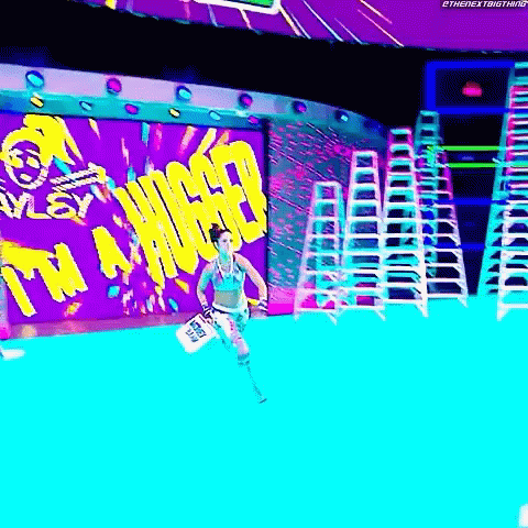 Woman Running In Front Of I'm Hungry Wall GIF