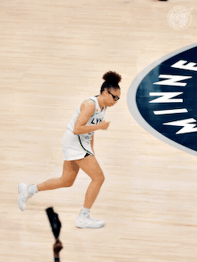 Woman Running On Basketball Court Minnesota GIF