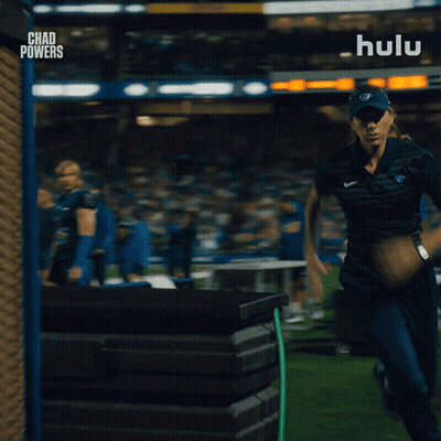 Woman Running On Field With Hulu GIF