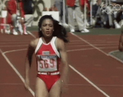 Woman Running On Track Number 563 GIF