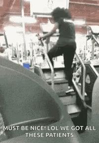 Woman Running On Treadmill Wearing Mask GIF