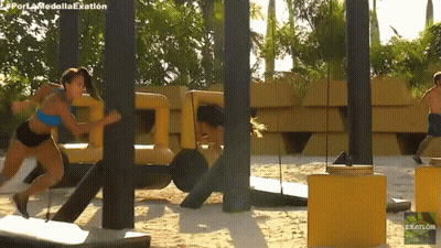 Woman Runs Obstacle Course Exation GIF