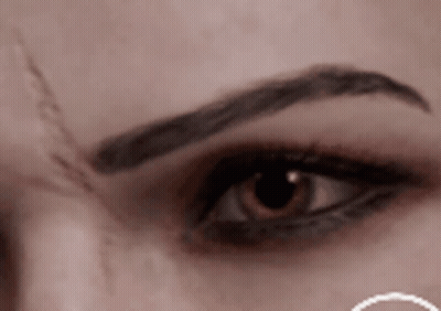 Woman's Eye With Eyebrow Tattoo GIF