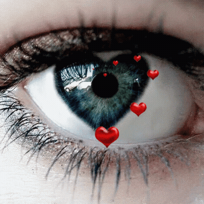 Woman's Eye With Red Hearts GIF