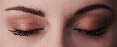 Woman's Eyes Closed Close Up GIF