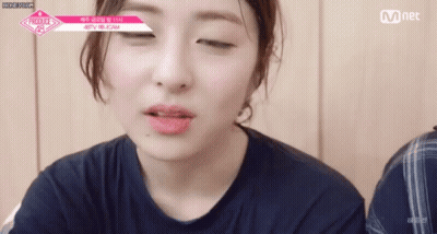Woman's Eyes Closed Mouth Open GIF