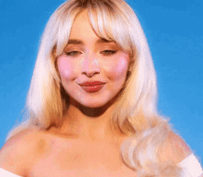 Woman's Face Against Blue Sky GIF