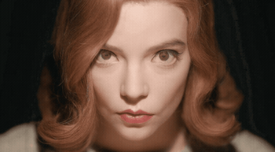 Woman's Face Close-Up Dark Background GIF