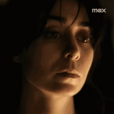 Woman's Face Close Up In Dark GIF