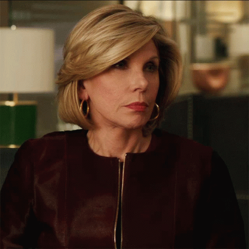 Woman's Face Close Up In Maroon Jacket GIF