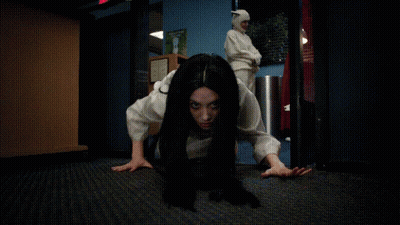 Woman's Face Close Up With Crawl GIF