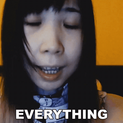 Woman's Face Close Up With Everything GIF