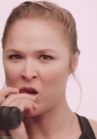 Woman's Face Close Up With Excaliburnerf GIF