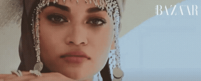 Woman's Face Close Up With Harper's Bazaar Logo GIF