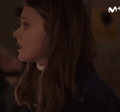 Woman's Face Close Up With M+ Logo GIF