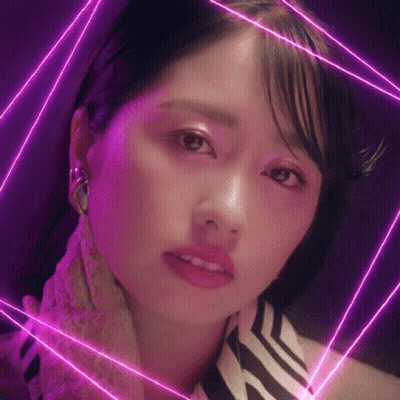 Woman's Face Close-Up With Purple Lights GIF