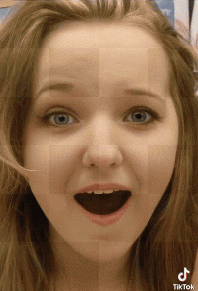 Woman's Face Close Up With TikTok Logo GIF