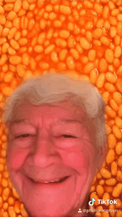 Woman's Face Collage Of Colors GIF