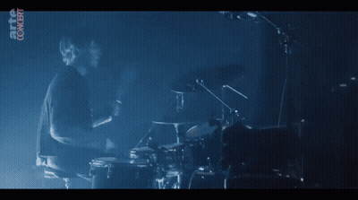 Woman's Face In Dark Close Up GIF