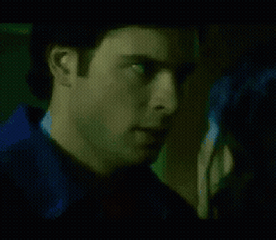 Woman's Face In Green Light GIF