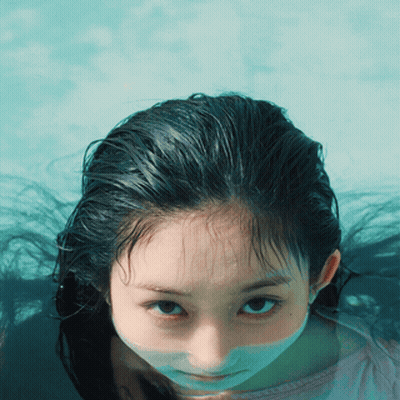 Woman's Face In Swimming Pool GIF