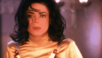 Woman's Face In Yellow Top GIF