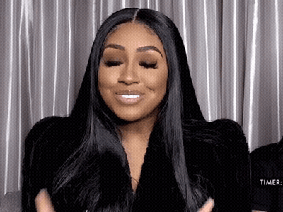 Woman's Face With Black Eye Shadow GIF