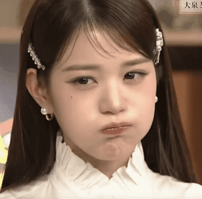 Woman's Face With Chinese Writing GIF