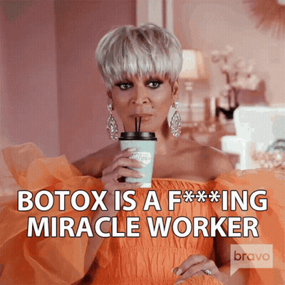 Woman's Face With Cross Necklace GIF