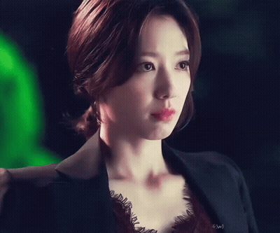 Woman's Face With E And W Letters GIF