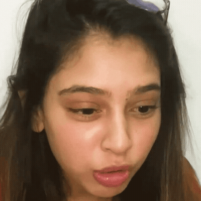 Woman's Face With Glasses GIF