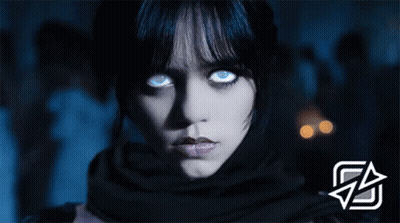 Woman's Face With Glowing Blue Eyes GIF