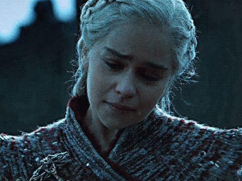 Woman's Face With Gray Sweater GIF