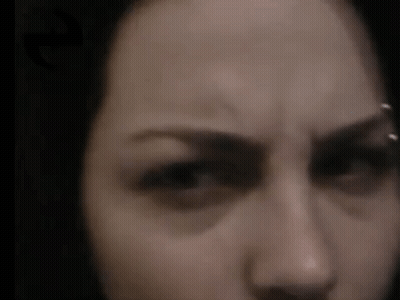 Woman's Face With Letter E Above Eye GIF