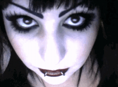 Woman's Face With Lip Piercings GIF
