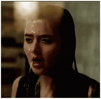 Woman's Face With Liquid On It GIF