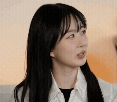 Woman's Face With Long Black Hair GIF