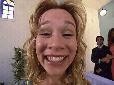 Woman's Face With Man In Suit GIF