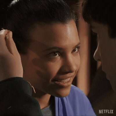 Woman's Face With Man's Hand On Head GIF