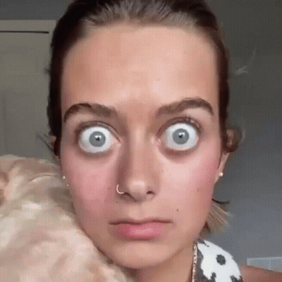Woman's Face With Nose Ring And Big Eyes GIF