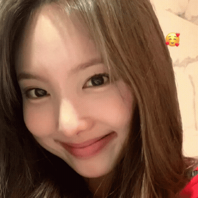 Woman's Face With Smiley Face GIF