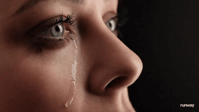 Woman's Face With Tear GIF