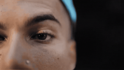 Woman's Face With Tear On Nose GIF