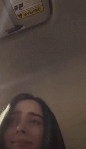 Woman's Face With Warning Sign GIF