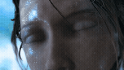 Woman's Face With Water Drops GIF