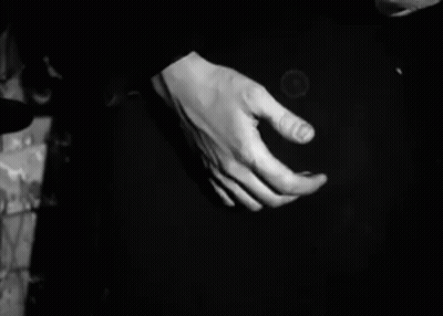 Woman's Hand In Black And White Photo GIF