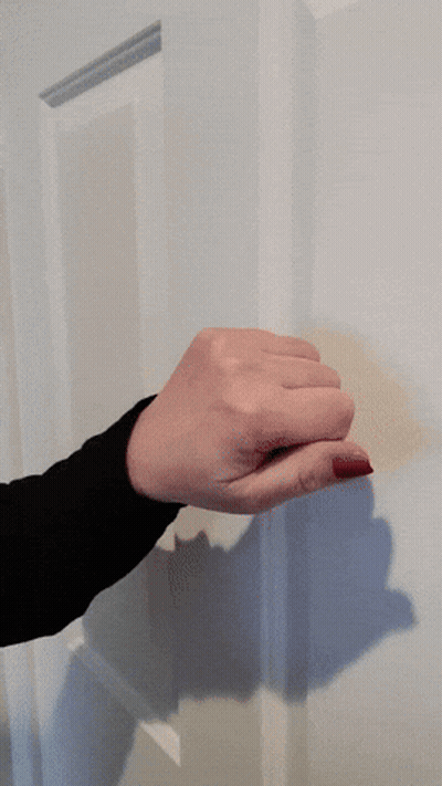 Woman's Hand With Red Nails Holding Door GIF