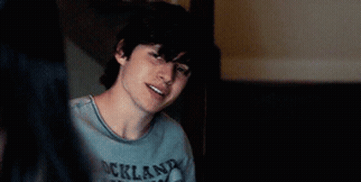 Woman's Head In Dark Room GIF