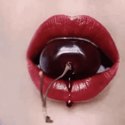 Woman's Lips With Cherry GIF