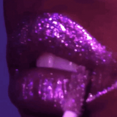 Woman's Lips With Purple Glitter And Lip Gloss GIF